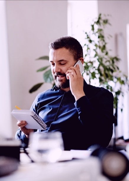 Renewable Energy Lending specialist talking on phone