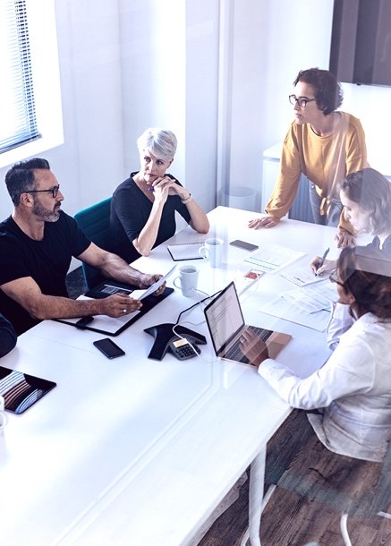 Team meeting in white room